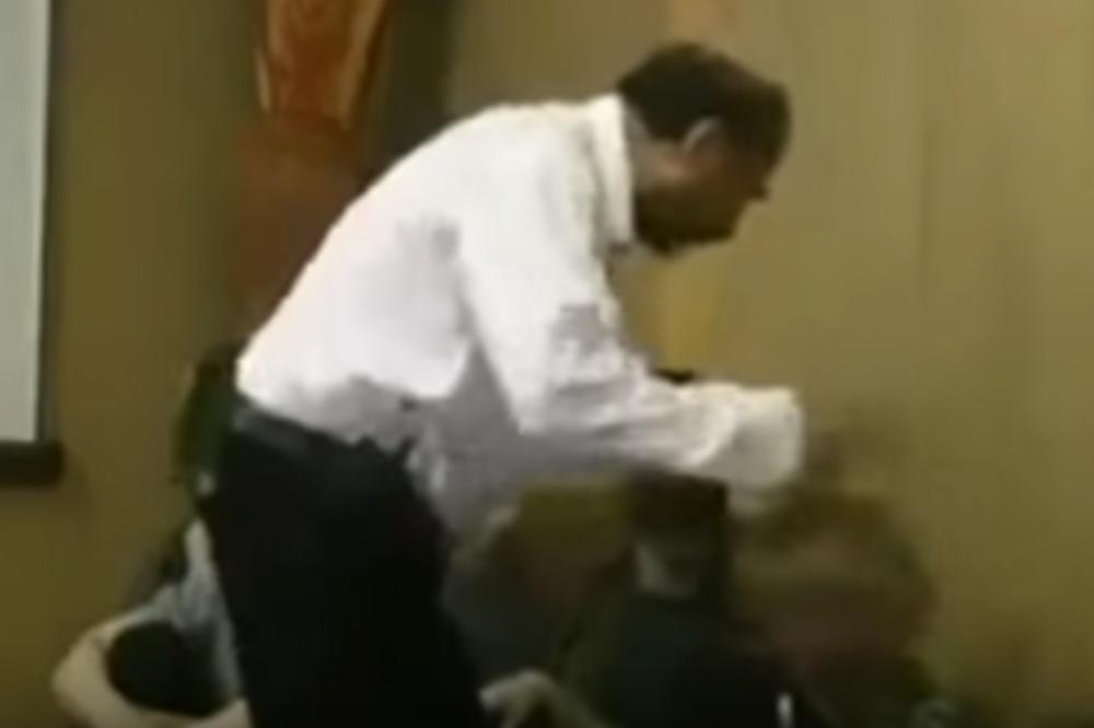 Kako sveštenik najefikasnije isteruje đavola iz žene? Šamarčinama! (VIDEO)