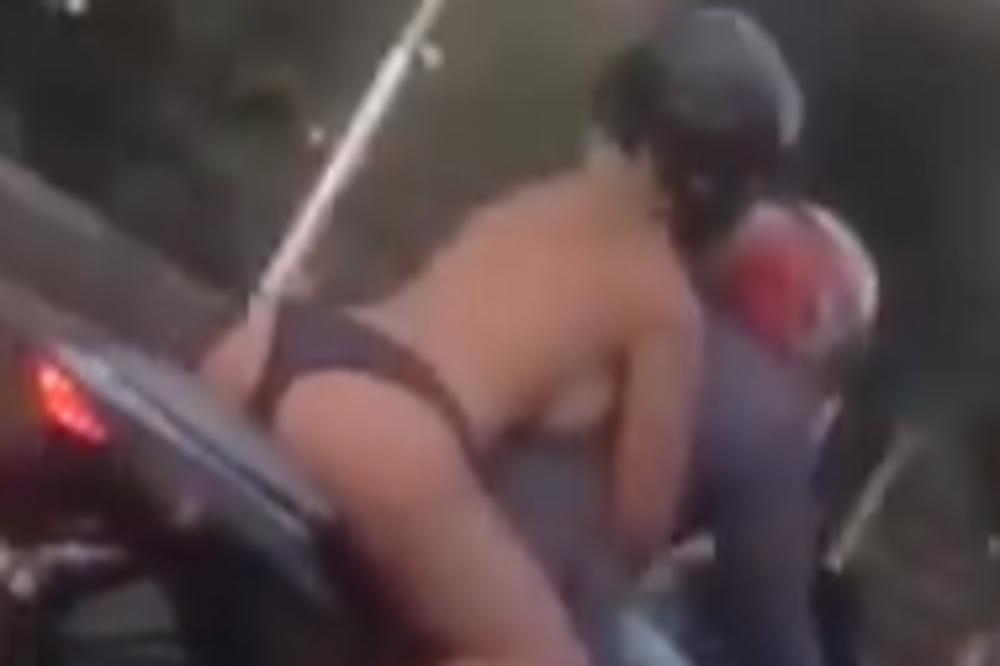 Samo tange i kaciga: Luda Ruskinja u toplesu provozala motor kroz grad (VIDEO)