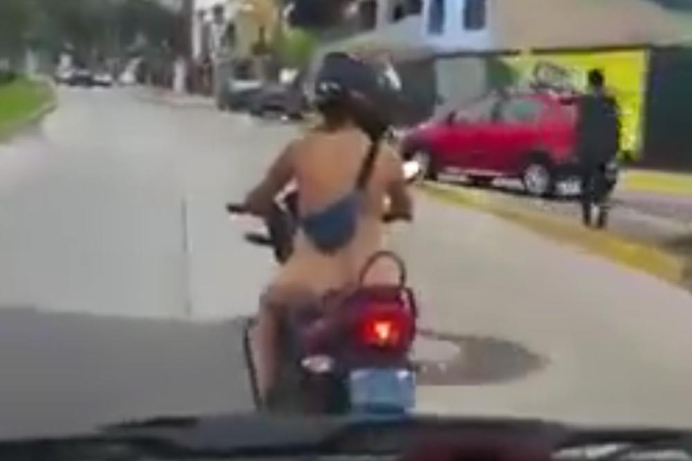 NAPRAVILA HAOS: Vozači u neverici blokirali saobraćaj kada su je videli POTPUNO GOLU! (VIDEO)