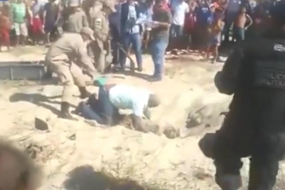 MRTAV PIJAN pao na MRTVACA! Forenzičara trojica izvlačila iz rake! (VIDEO)