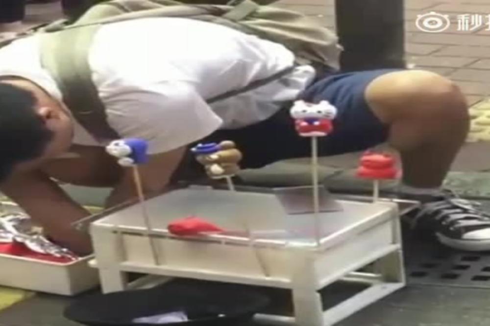 RUKE NE ČINE UMETNIKA: Ono što radi ovaj Kinez kosi se sa realnošću! (VIDEO)