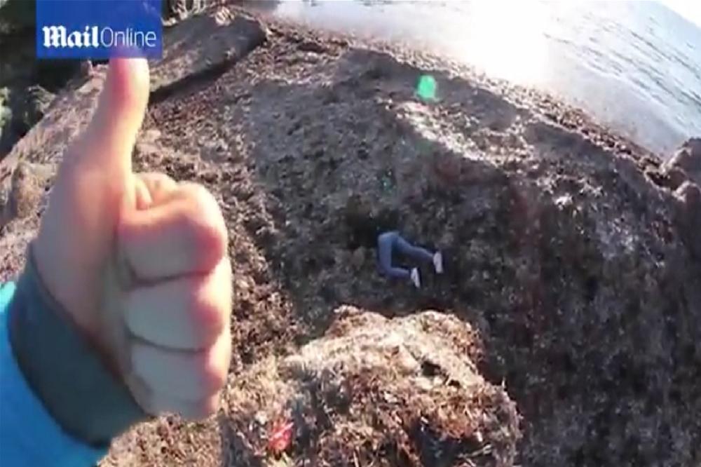 GURNUO DEVOJKU U PROVALIJU I SNIMIO SVE TELEFONOM: Ali da li je sve onako kako izgleda? (VIDEO)