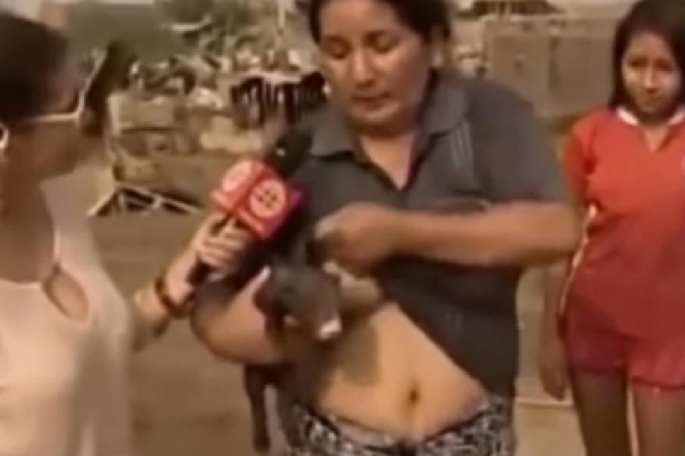 OVO JOŠ NISTE VIDELI: Zadigla majicu i podojila prase pred svetom! (VIDEO)