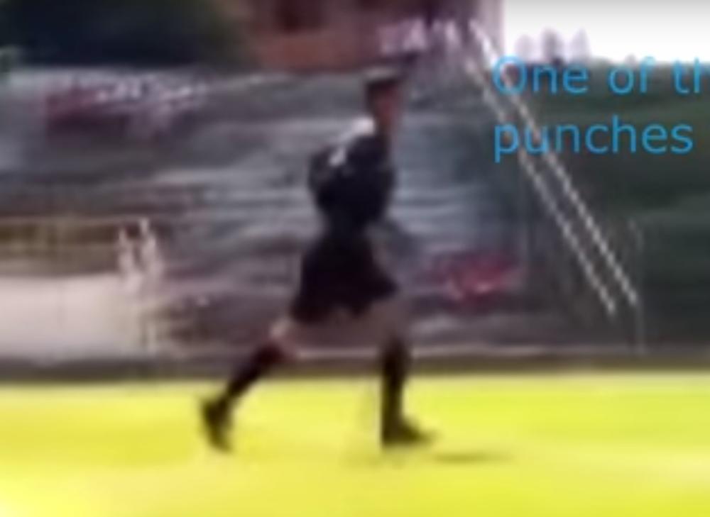 Ilustracija jurnjave za fudbalskim sudijom  