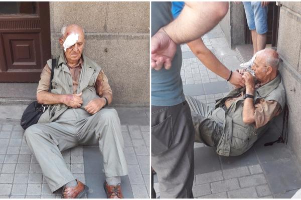 KRV NA SVE STRANE, BESPOMOĆAN ČOVEK LEŽI NA ULICI U CENTRU BEOGRADA: Šokantan prizor na 100 metara od Ateljea 212! (FOTO) (VIDEO)