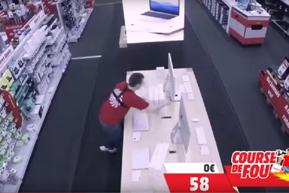 KOLIKO GA NOGE NOSE: Dobio je 100 sekundi da pokupi šta god želi iz radnje i ojadio ih je! (VIDEO)