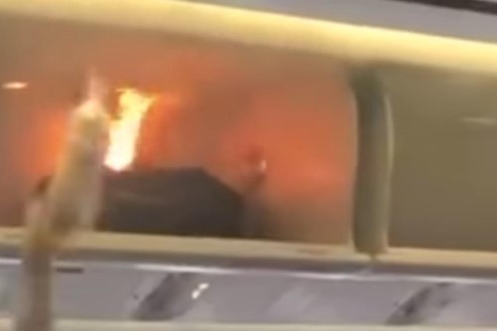 PUNJAČ ZA TELEFON IZAZVAO POŽAR U AVIONU: Putnici u šoku gledali kako PLAMEN guta sve pred sobom (VIDEO)