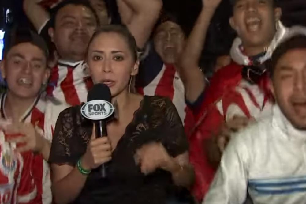 NOVINARKA SEKSUALNO UZNEMIRAVANA U ŽIVOM PROGRAMU: Navijač je uhvatio za guzu dok je izveštavala! (VIDEO)