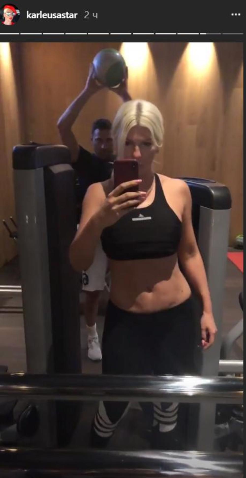 Jelena sa mužem u teretani 