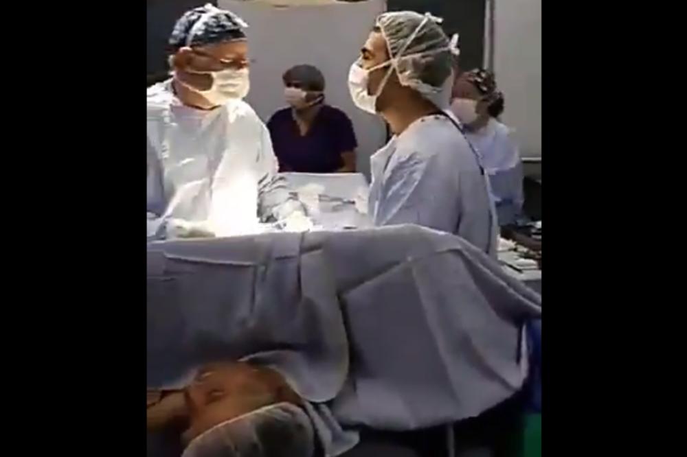 DOK OPERIŠU GLEDAJU UTAKMICU?! Pacijent otvoren na OPERACIONOM STOLU, a lekari gledaju MUNDIJAL! (VIDEO)