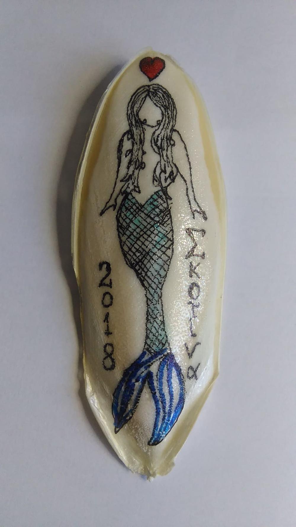 Mala sirena na kamenu   