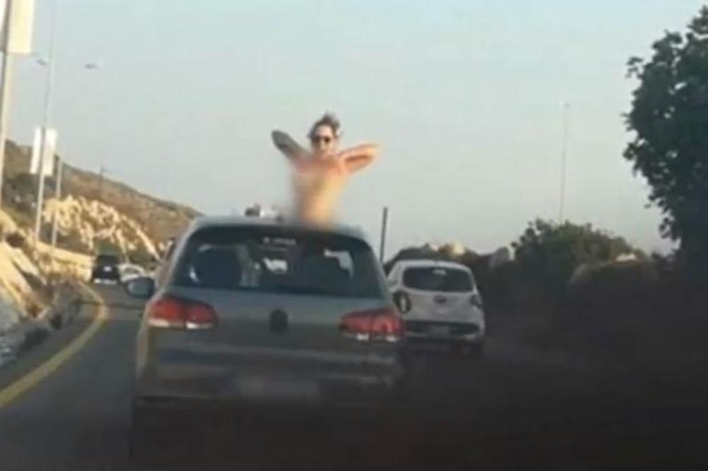 IZVIRILA JE IZ AUTA I POKAZALA GOLE GRUDI: Sad je zbog ovoga traži CELA DRŽAVA! (FOTO)