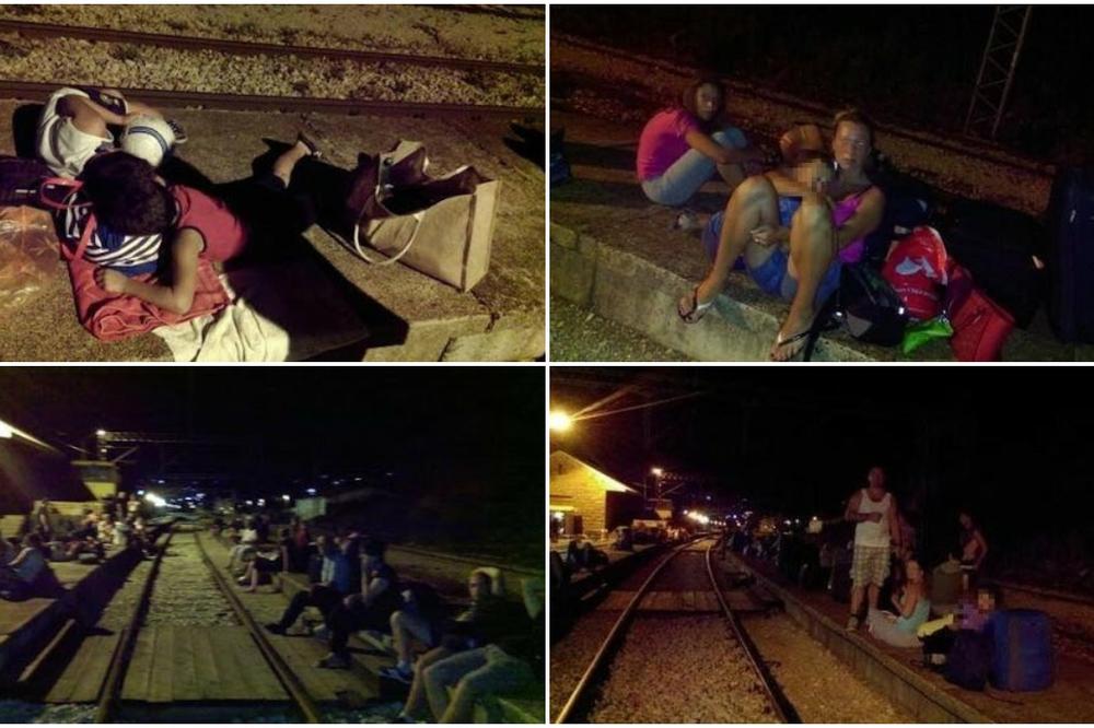 DECA SPAVALA PORED ŠINA SATIMA! Putnici u Sutomoru POLEGALI na BETON, jer kažu da ih niko nije obavestio da li će VOZ krenuti iz BARA! (FOTO)