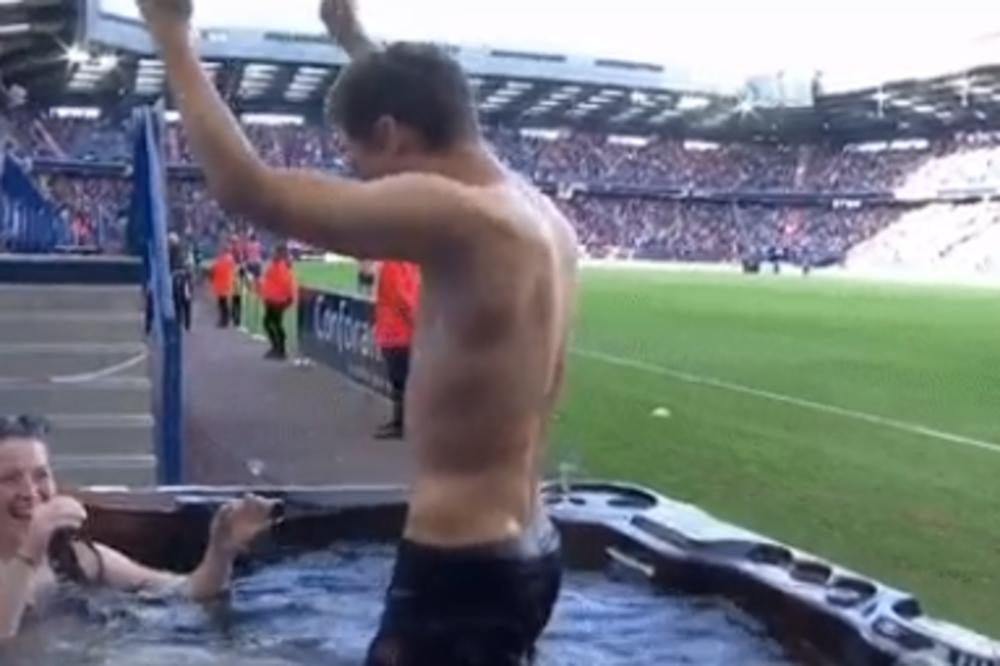 ŠTA JOŠ NEĆEMO VIDETI NA TERENU?! Navijač, polugola devojka, džakuzi i sve to usred  utakmice pored terena!