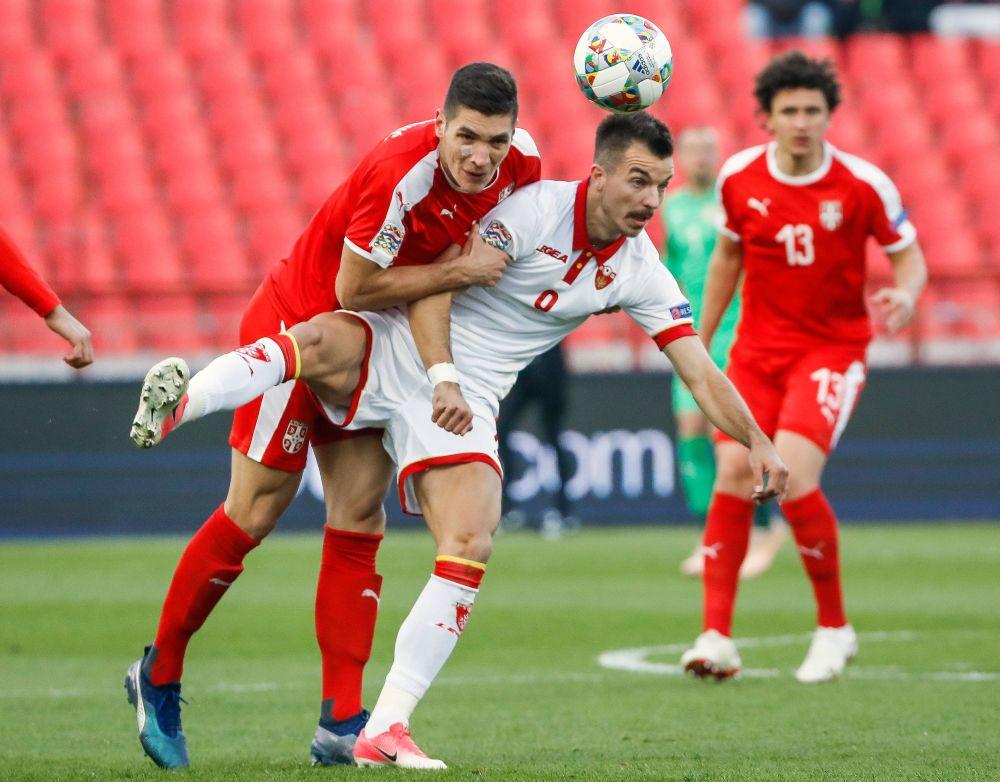 Nikola Milenković u duelu sa Stefanom Mugošom  