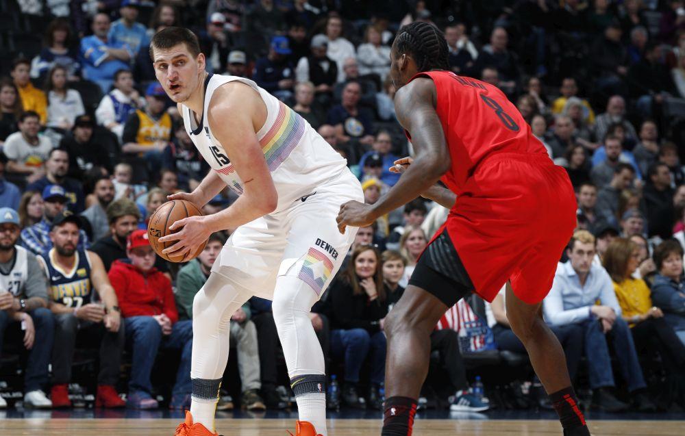 Nikola Jokić i Al-Faruk Aminu  