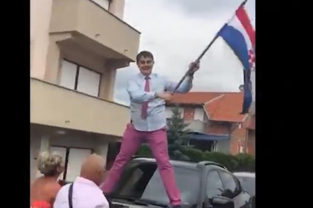 HRVAT JE MAHAO ZASTAVOM NA VESELJU: Toliko se zaneo da je seo na haubu - a onda se desio urnebes! (VIDEO)