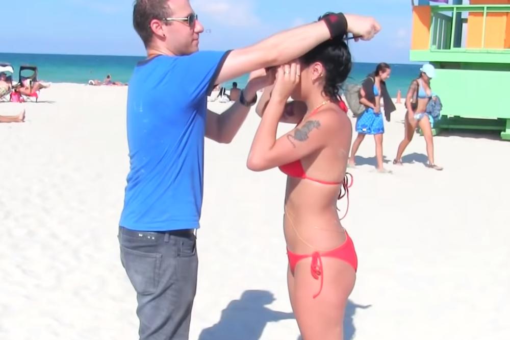 POKUŠAO JE DA POLJUBI NEPOZNATU DEVOJKU NA PLAŽI: Prvo je pristala, ali ga je ZBOG OVOGA OŠAMARILA! (VIDEO)