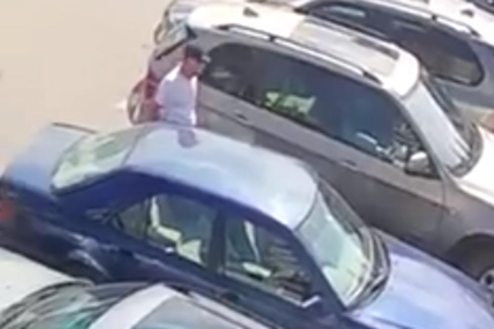 SNIMLJEN BANDIT U SRPSKOM GRADU: Lomi staklo na kolima, pa KRADE TORBICU SA SEDIŠTA! (VIDEO)