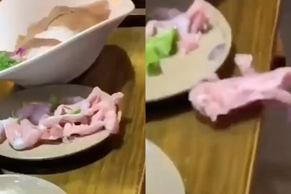PARČE MESA POČELO DA SE POMERA KAO DA JE ŽIVO, A ONDA JE ISKOČILO IZ TANJIRA! Žena u restoranu snimila jezivu scenu