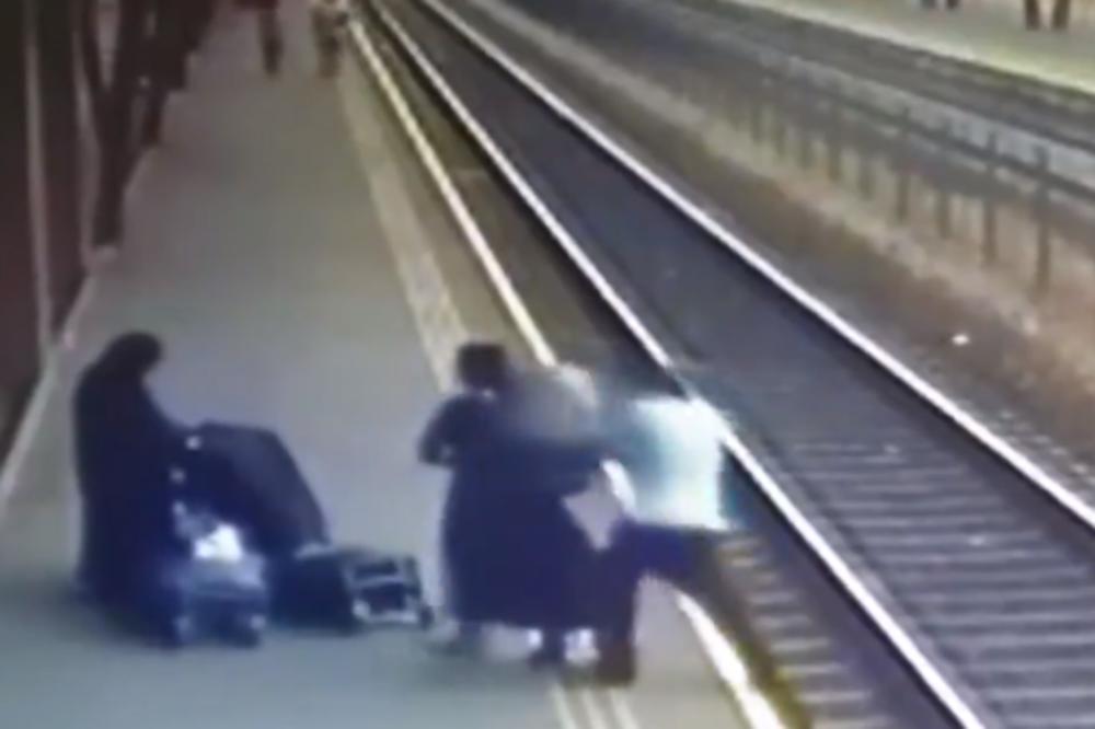 ČASNA SESTRA GURNULA MUŠKARCA NA ŠINE! Kamera snimila šokantni POKUŠAJ UBISTVA, a ovo je pozadina priče (VIDEO)