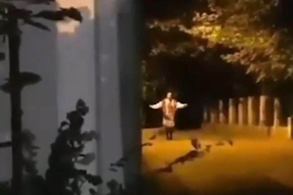 HOROR SCENE NA ZVEZDARI: Usred noći žena u narodnoj nošnji igra kolo, pa vadi nož i preti ljudima! (VIDEO)
