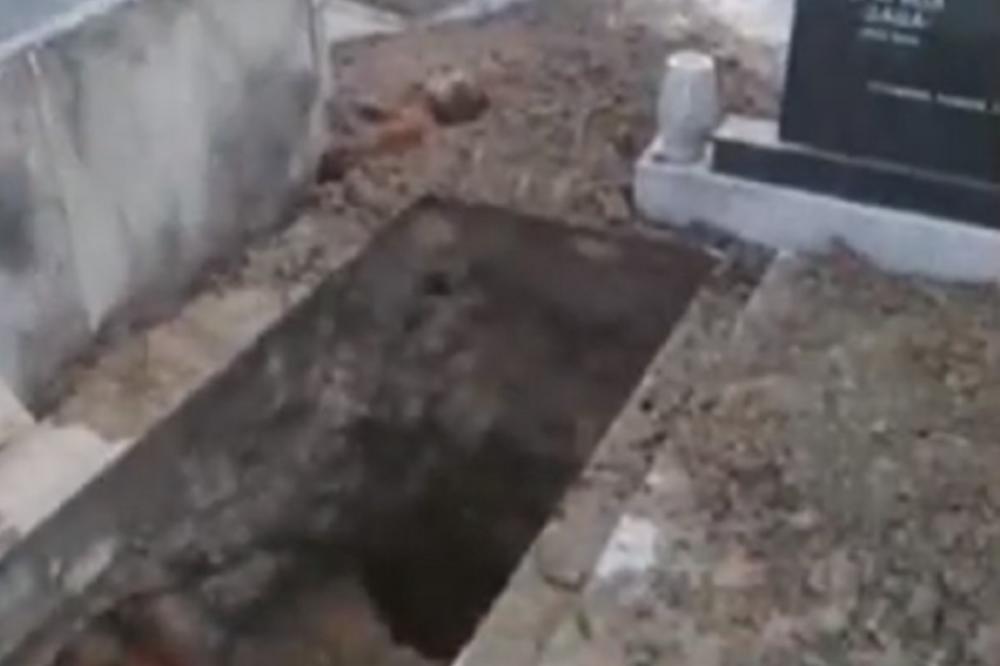 UŽAS! Otkopan GROB u Starim Banovcima, odneta glava iz kovčega! POLICIJA VRŠI UVIĐAJ NA LICU MESTA