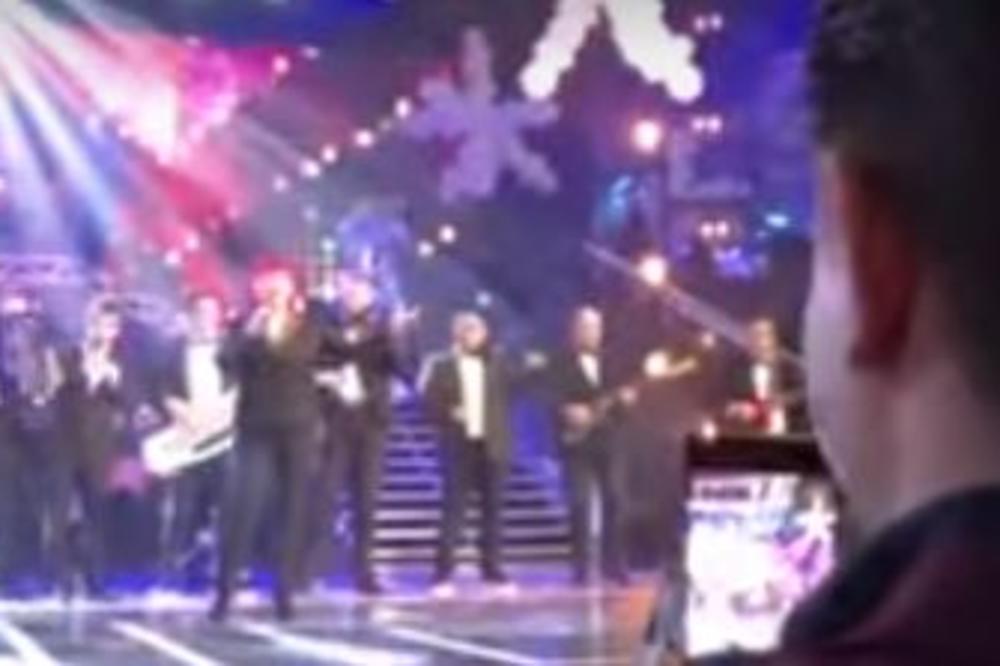 KO JE MLADIĆ S KEMIŠOM? Dok Zorica peva, evo šta njen suprug radi SA NJIM iza scene (VIDEO)