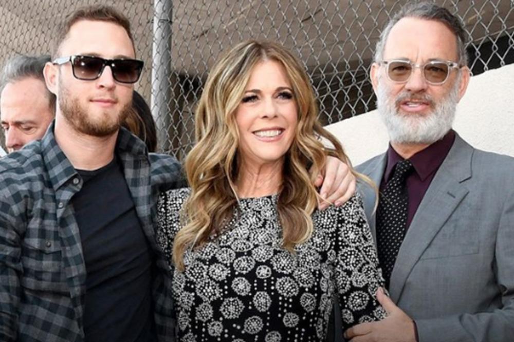 SLAVNI PAR ZARAŽEN KORONAVIRUSOM, NJIHOV NASLEDNIK PORUČIO SAMO JEDNO: Javio se sin Toma Henksa i RASTUŽIO PORUKOM!