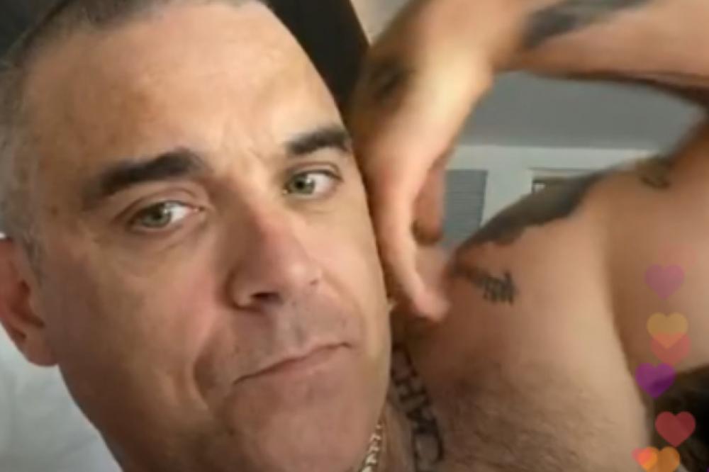 NEDOSTAJU MI ŽENA I DECA! Robi Vilijams ne izlazi iz kreveta zbog koronavirusa, moli se i peva