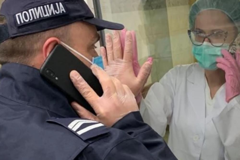 OVA FOTOGRAFIJA NAJBOLJE POKAZUJE SVU ŽRTVU OSOBLJA U SRBIJI: Emotivan susret policajca i medicinske sestre (FOTO)