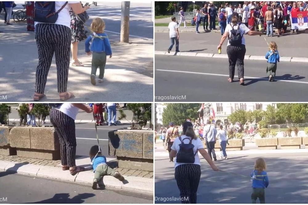 ŽENA NA "POVOCU" VUKLA MALO DETE PO ULICI DOK JE ISPIJALA PIVO! Stravična scena u centru Beograda (FOTO)