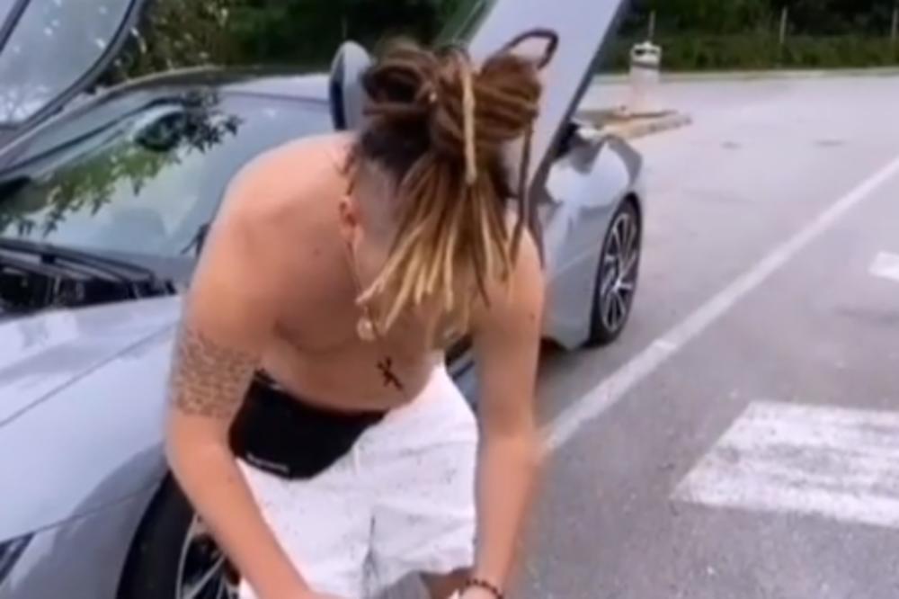 ŠTA TO RADI RASTA NA PARKINGU? Bez majice sam, samo se sagnuo...(VIDEO)