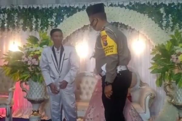 POLICAJAC JE DOŠAO NA SVADBU I VIDEO MLADOŽENJU BEZ MASKE: Usledila je urnebesna kazna (VIDEO)