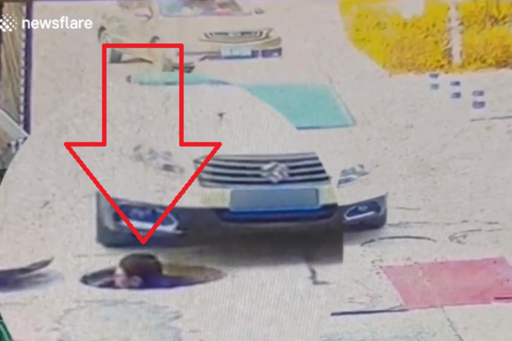 KINEZ PROMOLIO GLAVU IZ KANALIZACIJE PA MU JE GLAVU PREGAZIO AUTO: Stvarno se desilo, POGLEDAJTE! (VIDEO)