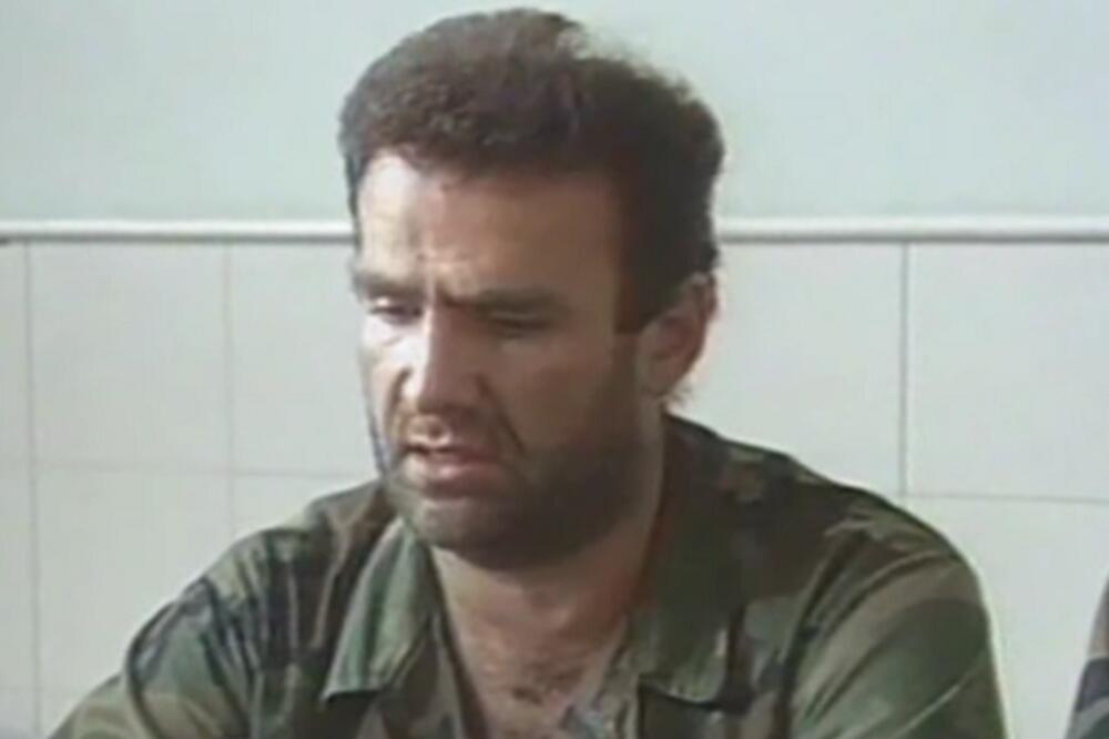 ISPLIVALA POTRESNA FOTOGRAFIJA SA GIŠKINE SAHRANE: Neutešnu Milenu smiruje čuveni kriminalac (FOTO)