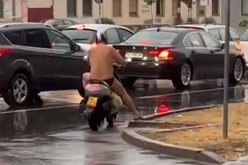 HIT SNIMAK IZ NOVOG SADA, PLAKANJE OD SMEHA: Čovek RAZGAĆEN vozio SKUTER PO GRADU usred OLUJČINE! POBEDA (VIDEO)