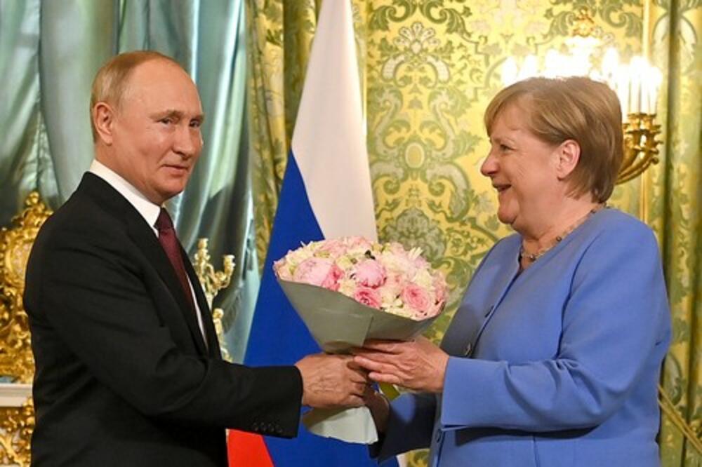 Putin i Angela Merkel