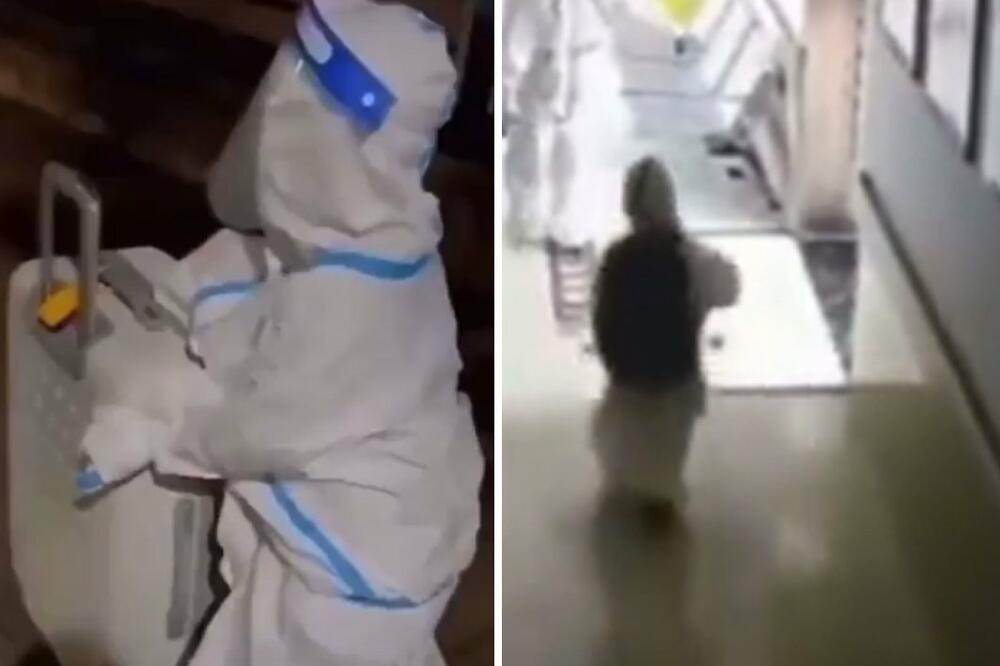 SNIMAK KOJI JE RASTUŽIO MILIONE LJUDI: Dete (4) zaraženo koronom, u skafanderu sa ogromnom torbom, bez pratnje