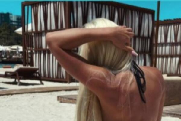 OVO NISTE VIDELI DO SAD! Vrele fotke naše pevačice DIŽU PRITISAK, POZADINA ZA DESETKU: Znate li ko je ovo?