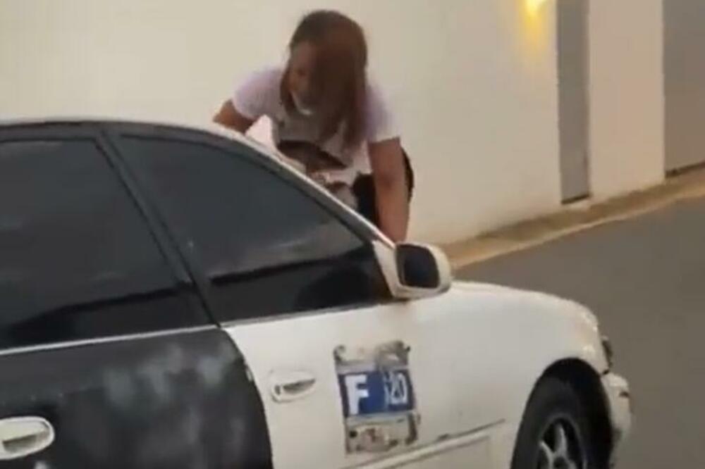 VIDELA MUŽA SA LJUBAVNICOM PA NAPRAVILA SKANDAL! Sela na haubu i počela da se DERE (VIDEO)