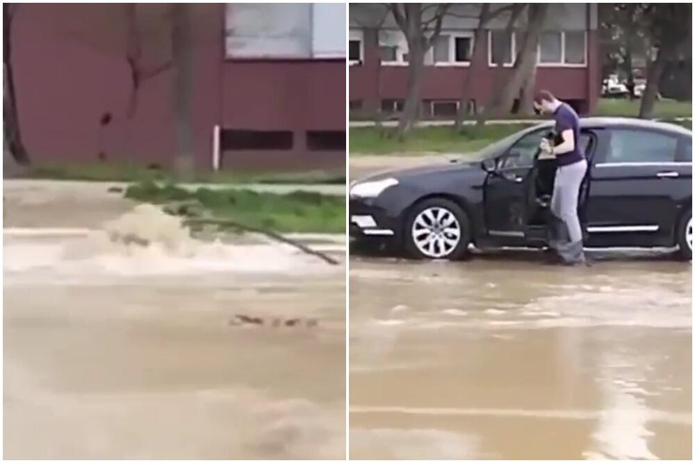 PROPAST U BULEVARU MILUTINA MILANKOVIĆA! Voda šiklja na sve strane, čovek jedva ušao u auto od bujice (VIDEO)