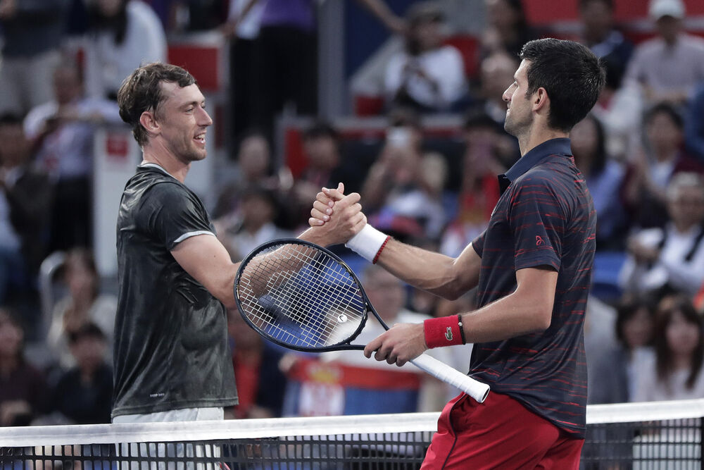Džon Milman i Novak Đoković