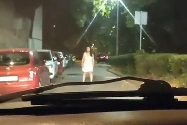 SCENA IZ HOROR FILMA USRED BEOGRADA: Žena u BELOJ spavaćici ISKOČILA vozaču pred automobil, SKAMENIO SE! (VIDEO)