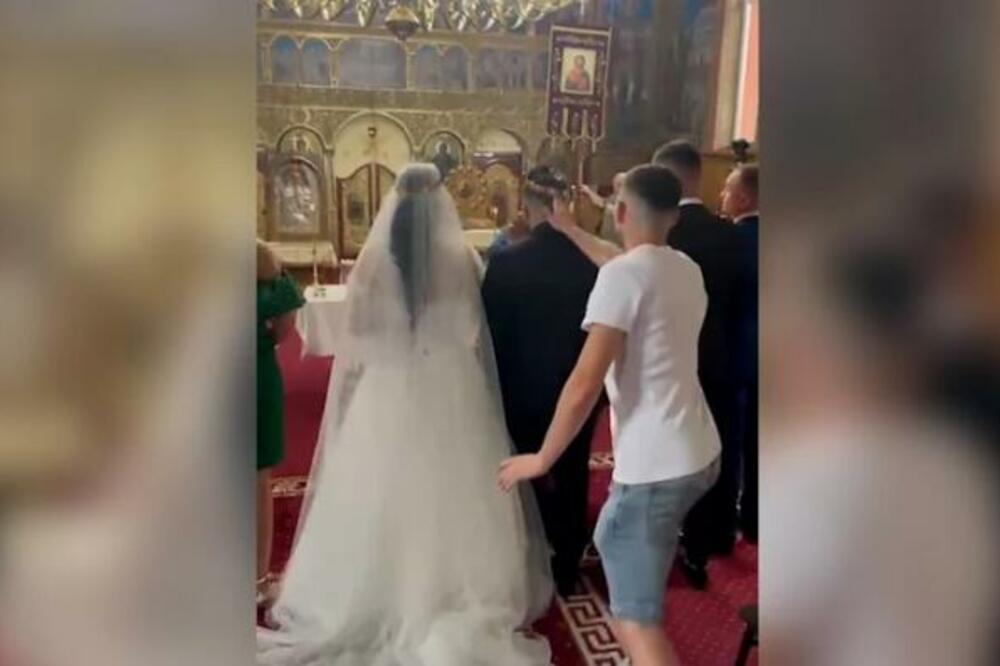 USRED CRKVENOG VENČANJA URADIO BIZARNU STVAR: Gost RAZBESNEO sve, zar mu NIŠTA nije SVETO?! (VIDEO)