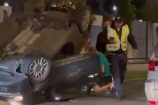 STRAVIČNA NESREĆA KOD PALATE PRAVDE: Auto smrskan prevrnut na KROV, policija na terenu! (VIDEO)