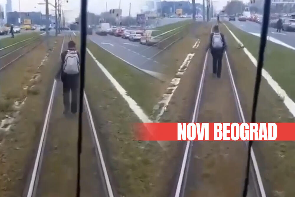 MOGAO JE GLAVU DA IZGUBI! Pešak na Novom Beogradu HODA PO ŠINAMA, tramvaj mu se PRIBLIŽIO, a on se NE POMERA! VIDEO