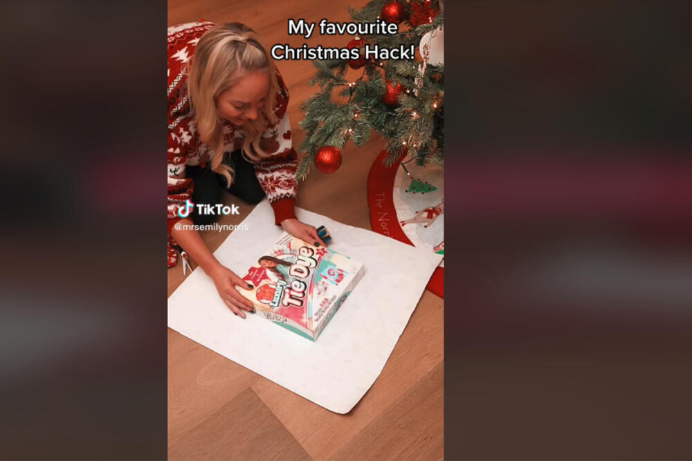 CAKA ZA MOTANJE POKLONA KAD NEMATE DOVOLJNO PAPIRA: Ova žena je to uspela u SAMO DVA POTEZA (VIDEO)