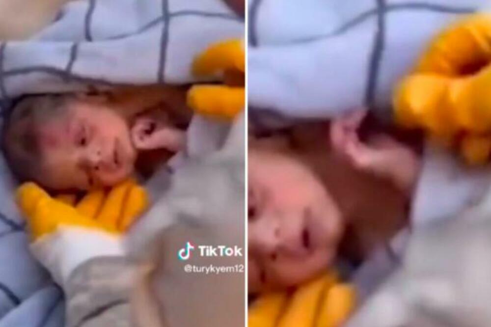 IZ RUŠEVINA IZVUČENA BEBA STARA 20 DANA! Spasioci ostali bez reči kada su videli šta drži u ruci (VIDEO)