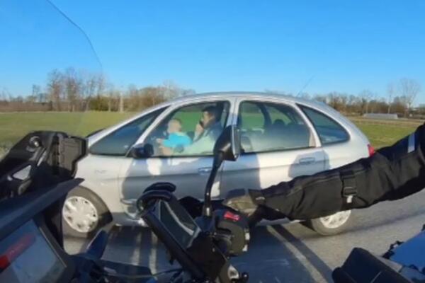 OVO MORA NEKO DA KAZNI, DA LI JE OVAJ ČOVEK NORMALAN?! Srbija besna na bahatog vozača, U KRILU MU DETE (VIDEO)